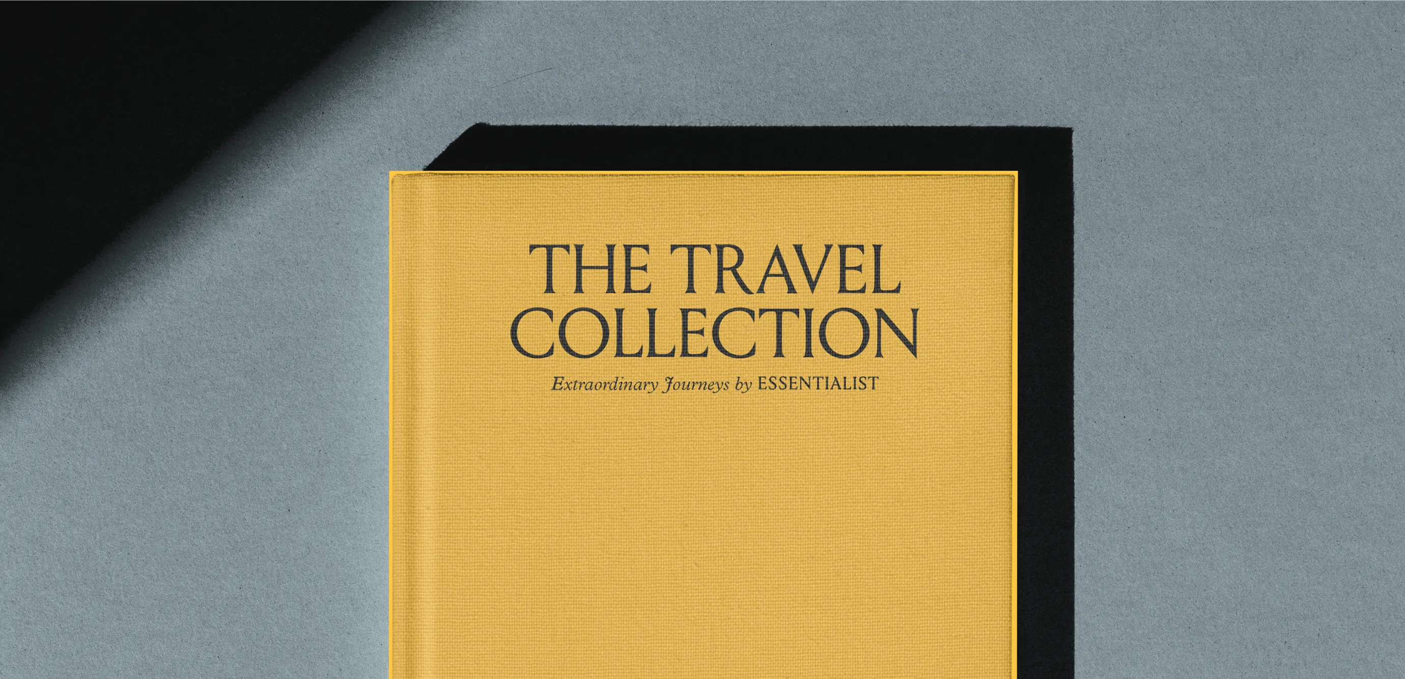 Close up photo of the cover of 'The Travel Collection' book by Essentialist.